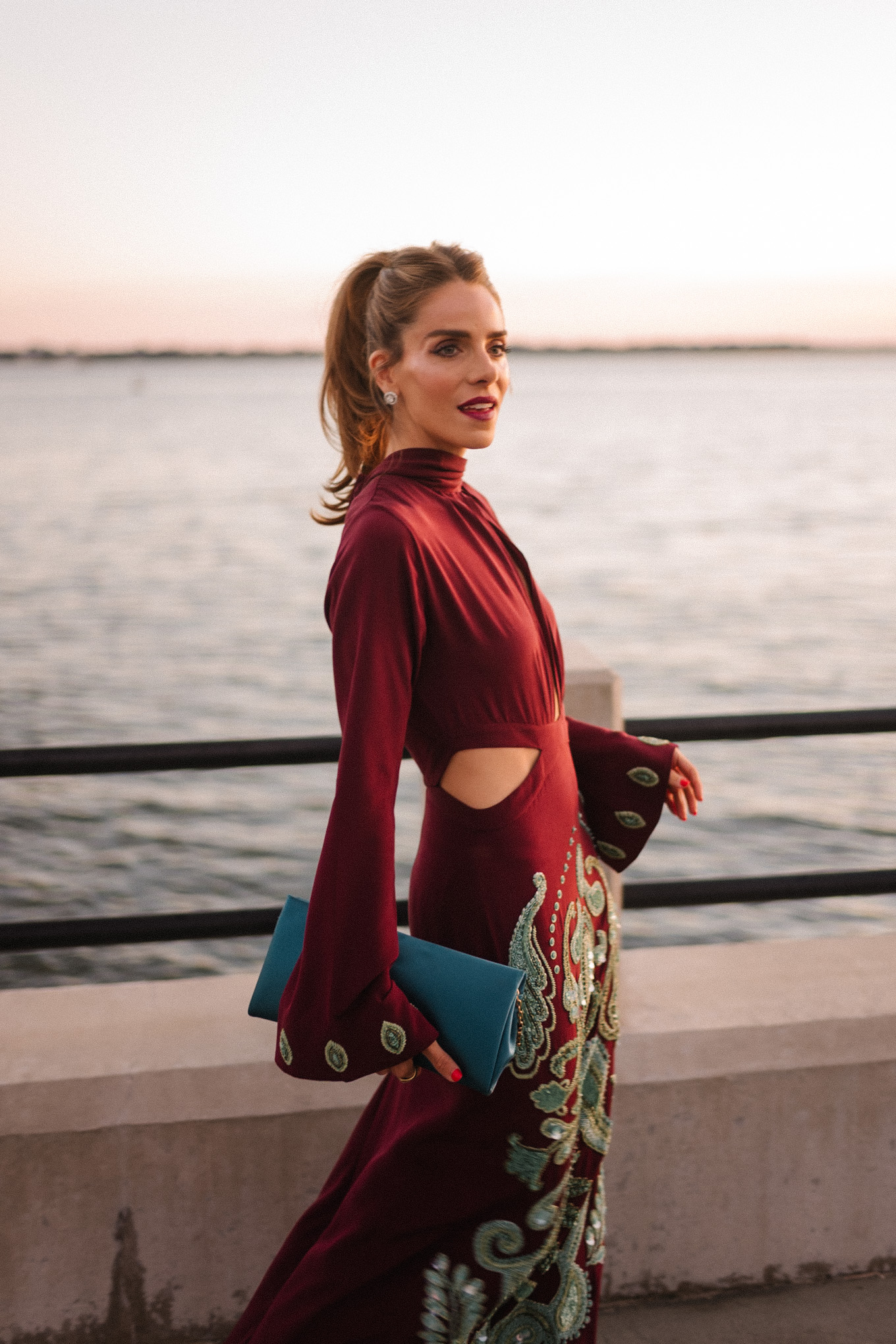 maroon and teal silk beaded gown turquoise clutch pink heels diamond earrings