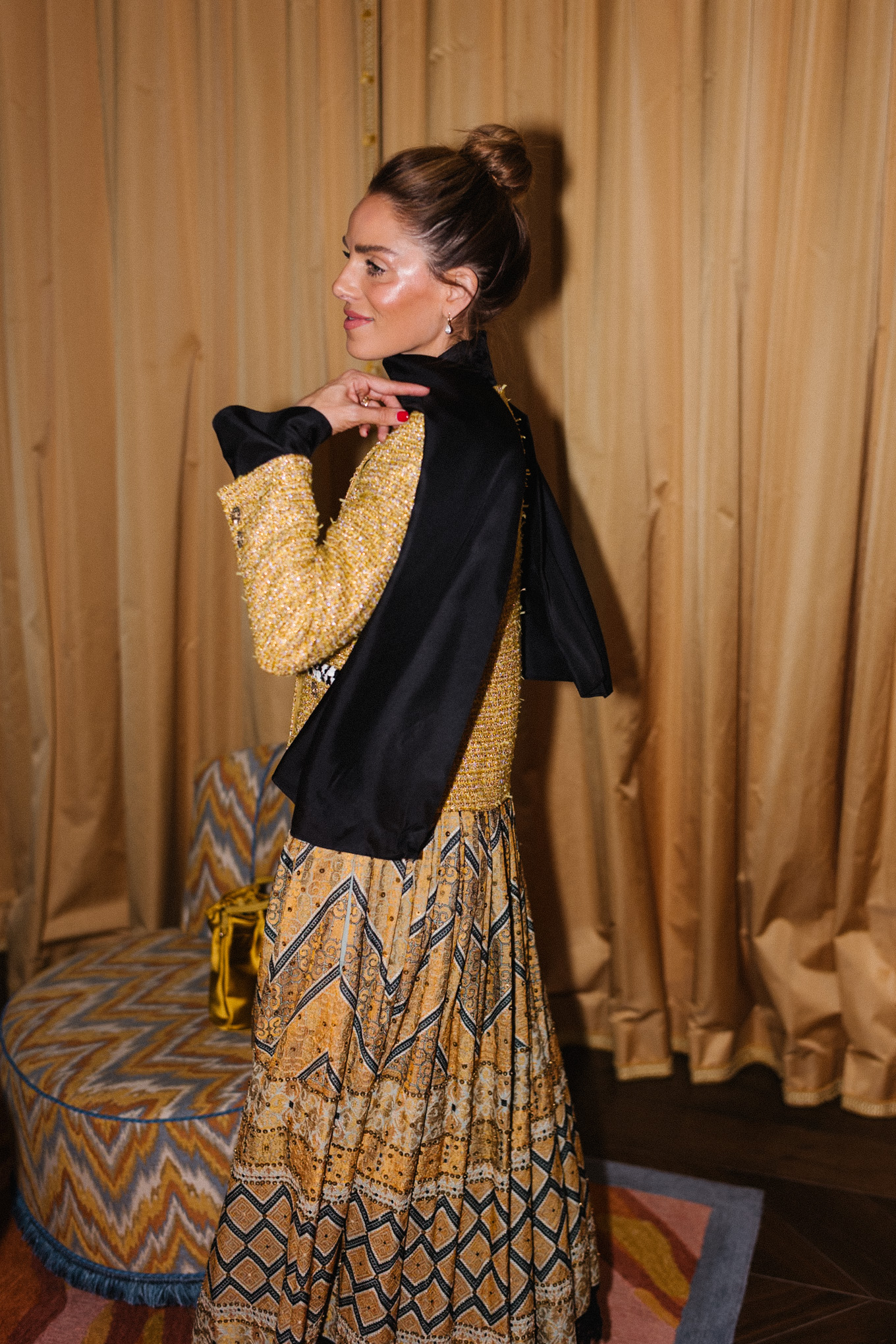 gold tweed jacket gold print skirt gold silk bucket bag black scarf black boots