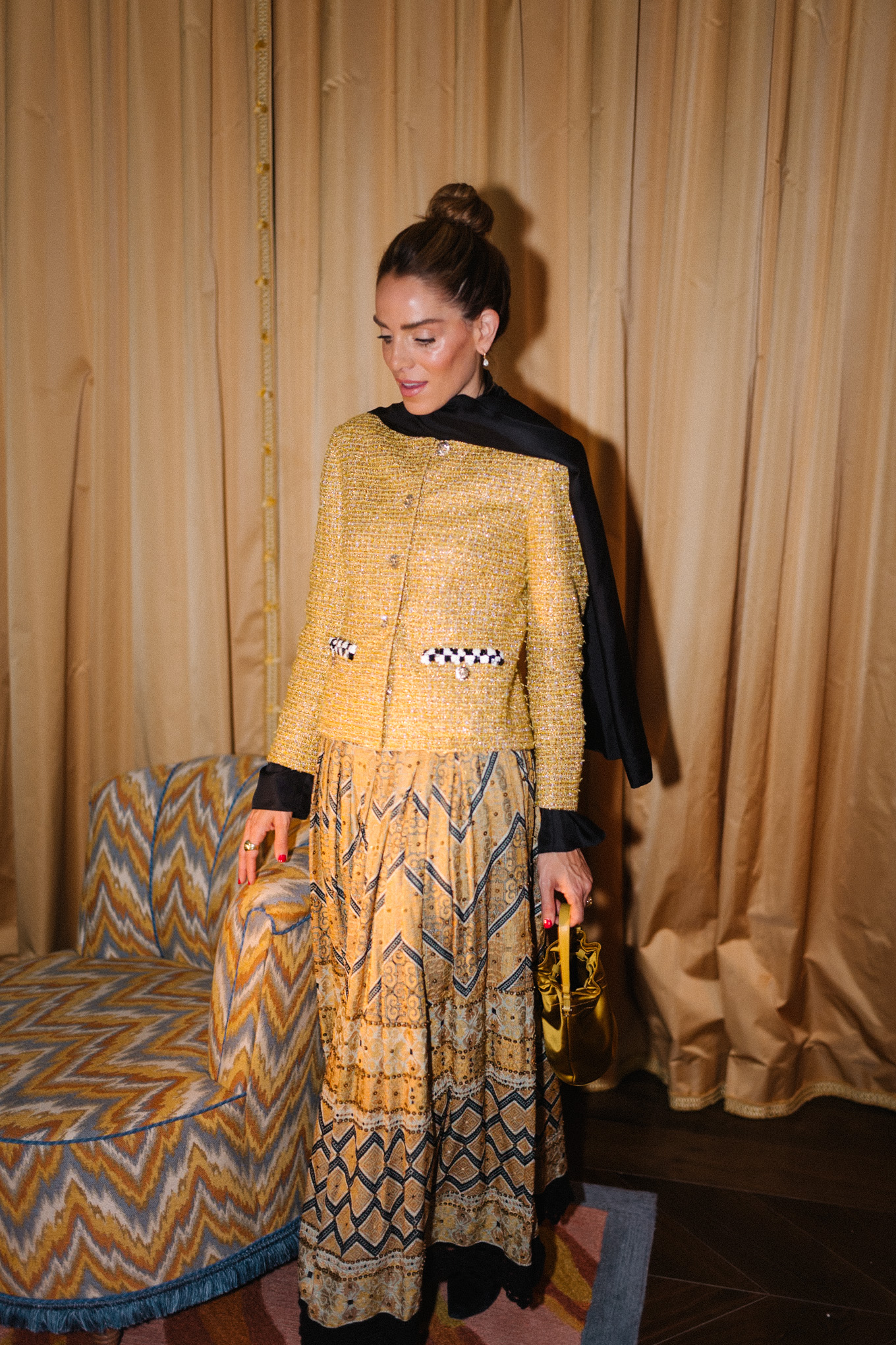 gold tweed jacket gold print skirt gold silk bucket bag black scarf black boots