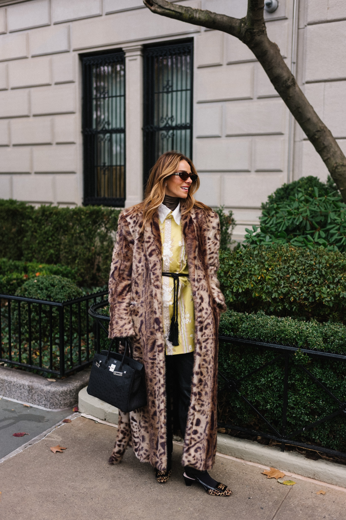 leopard coat silk jacket brown turtleneck tassel belt black handbag black gloves