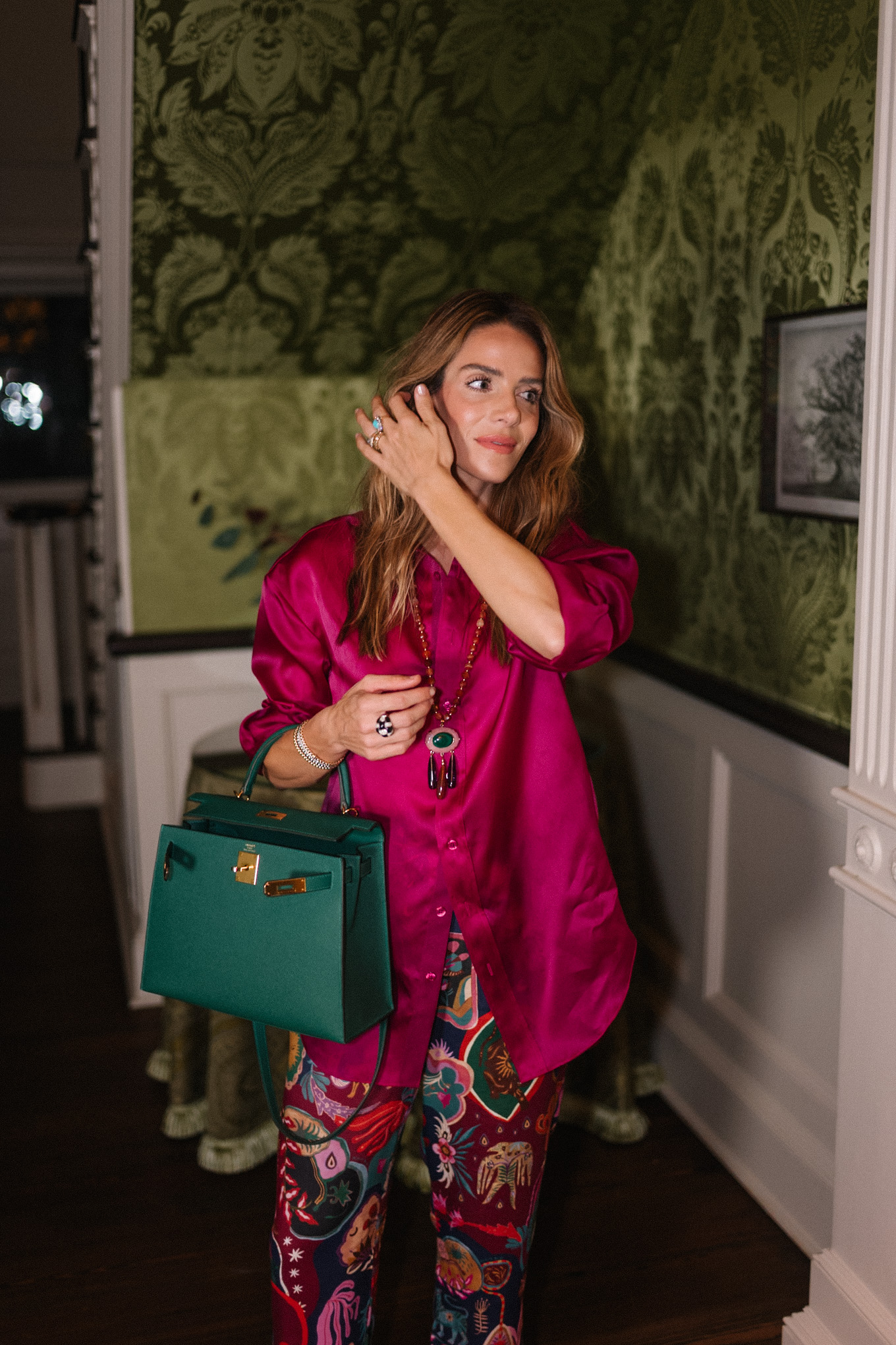 magenta silk blouse silk patterned pants green handbag