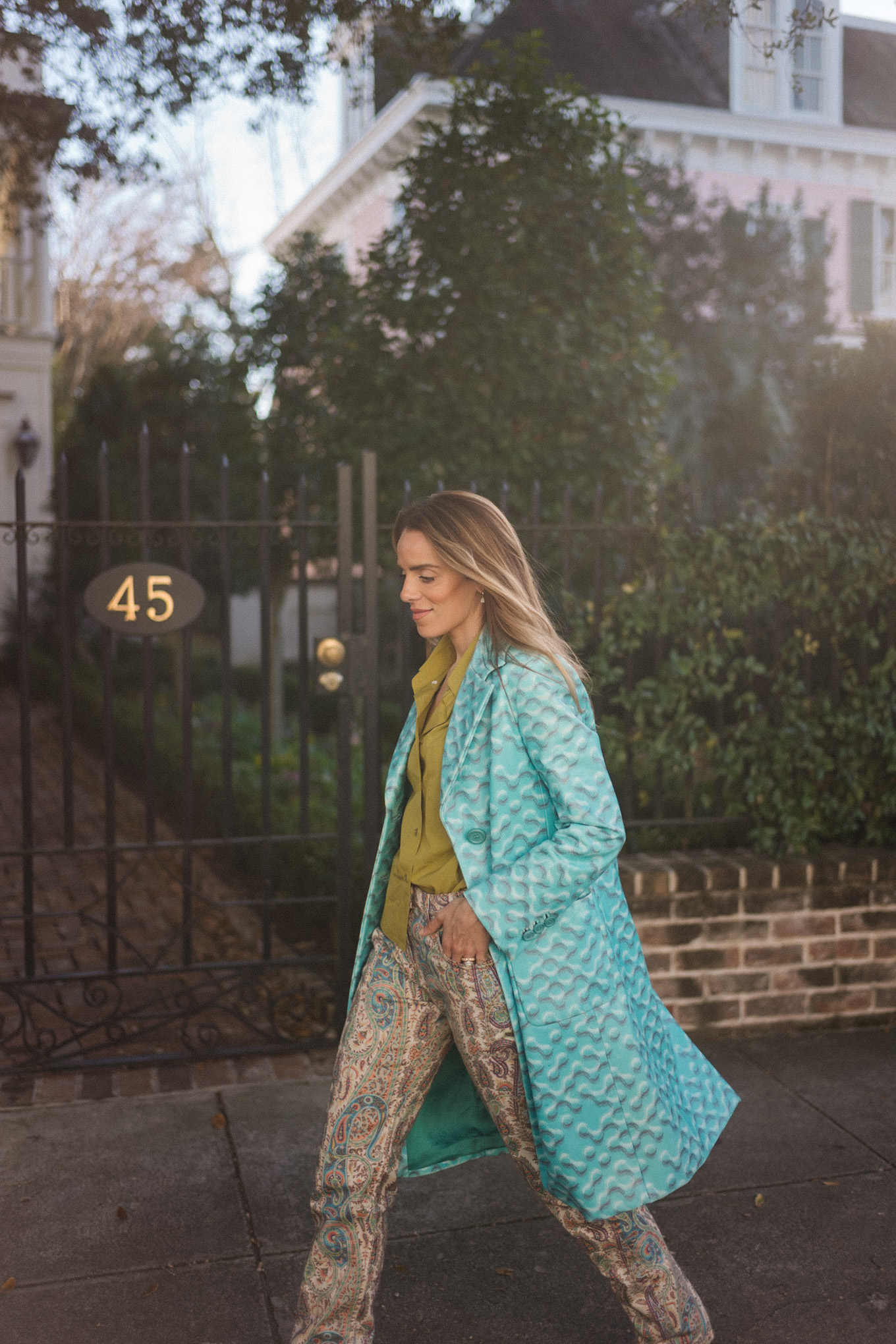 turquoise vintage coat chartreuse green button down shirt paisley jeans brown boots