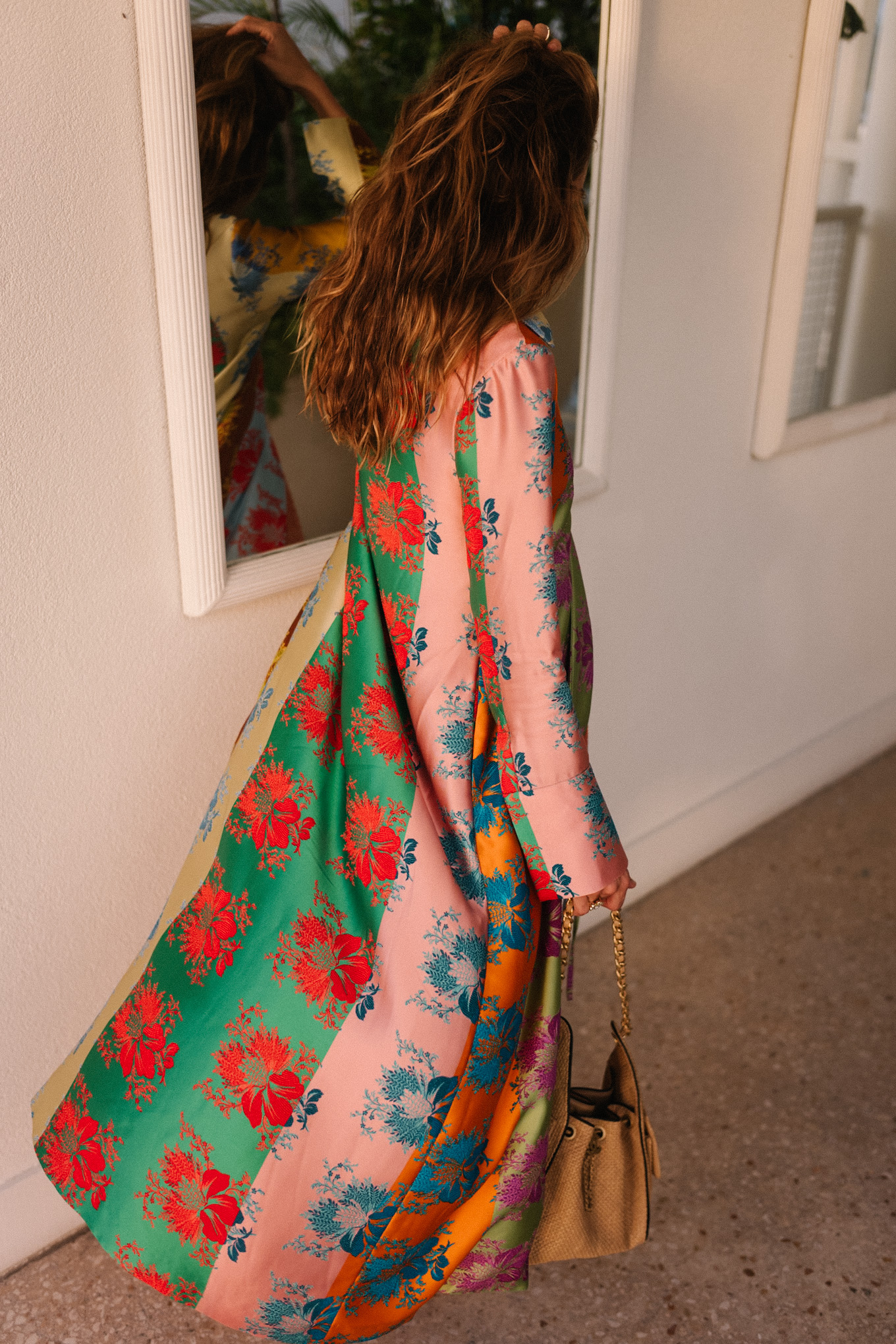 rainbow floral silk jacket silk wide leg pants rainbow beaded necklace rattan bag