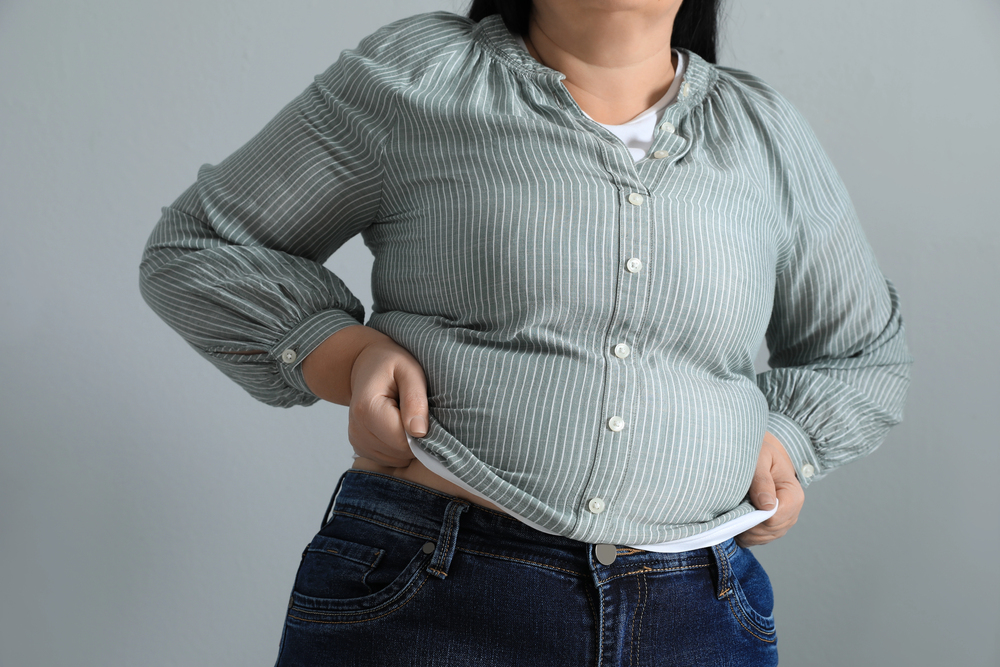 Plus size woman testing clothes